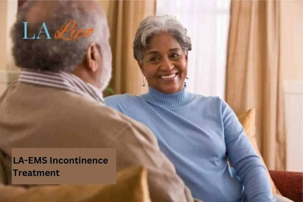 Couple sat smiling at each other - LA-EMS treatment West Drayton