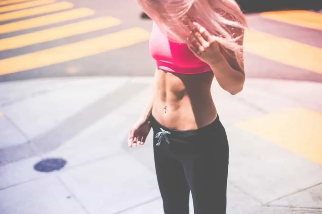Woman with toned stomach after LA-EMS Body Sculpting Treatment West Drayton