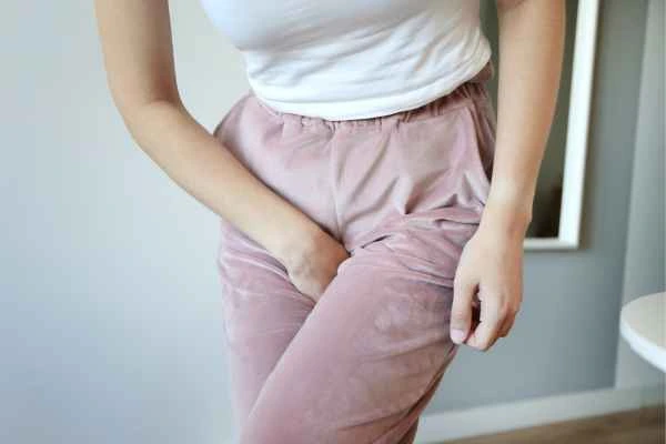 woman running for the toilet because of urinary incontinence West Drayton